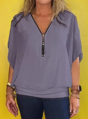 Blusa de Chiffon Europeu com gola alta e zíper.