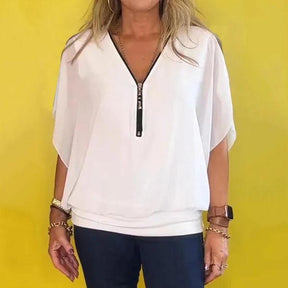 Blusa de Chiffon Europeu com gola alta e zíper.